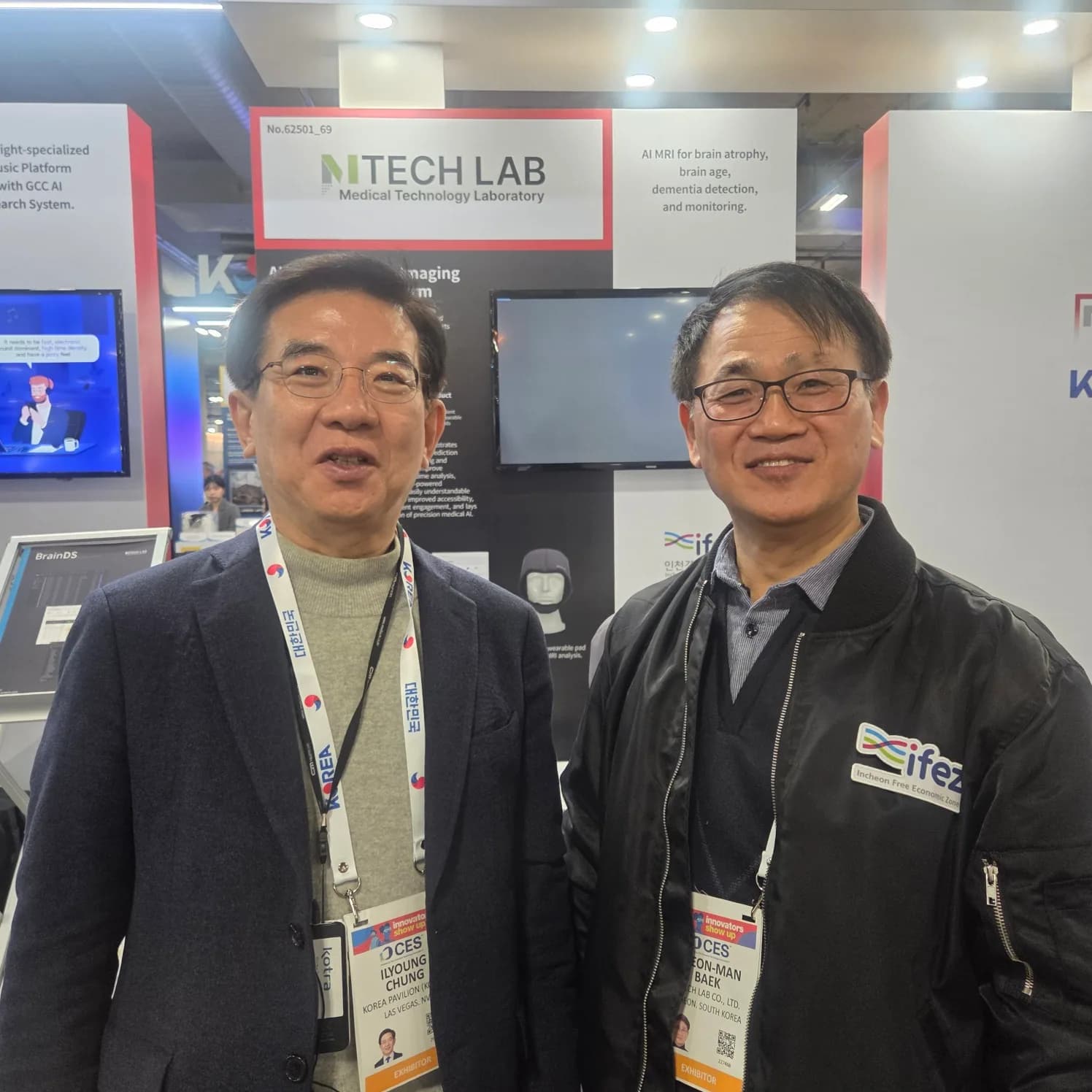 Two MTechLab representatives at the company booth during CES 2026