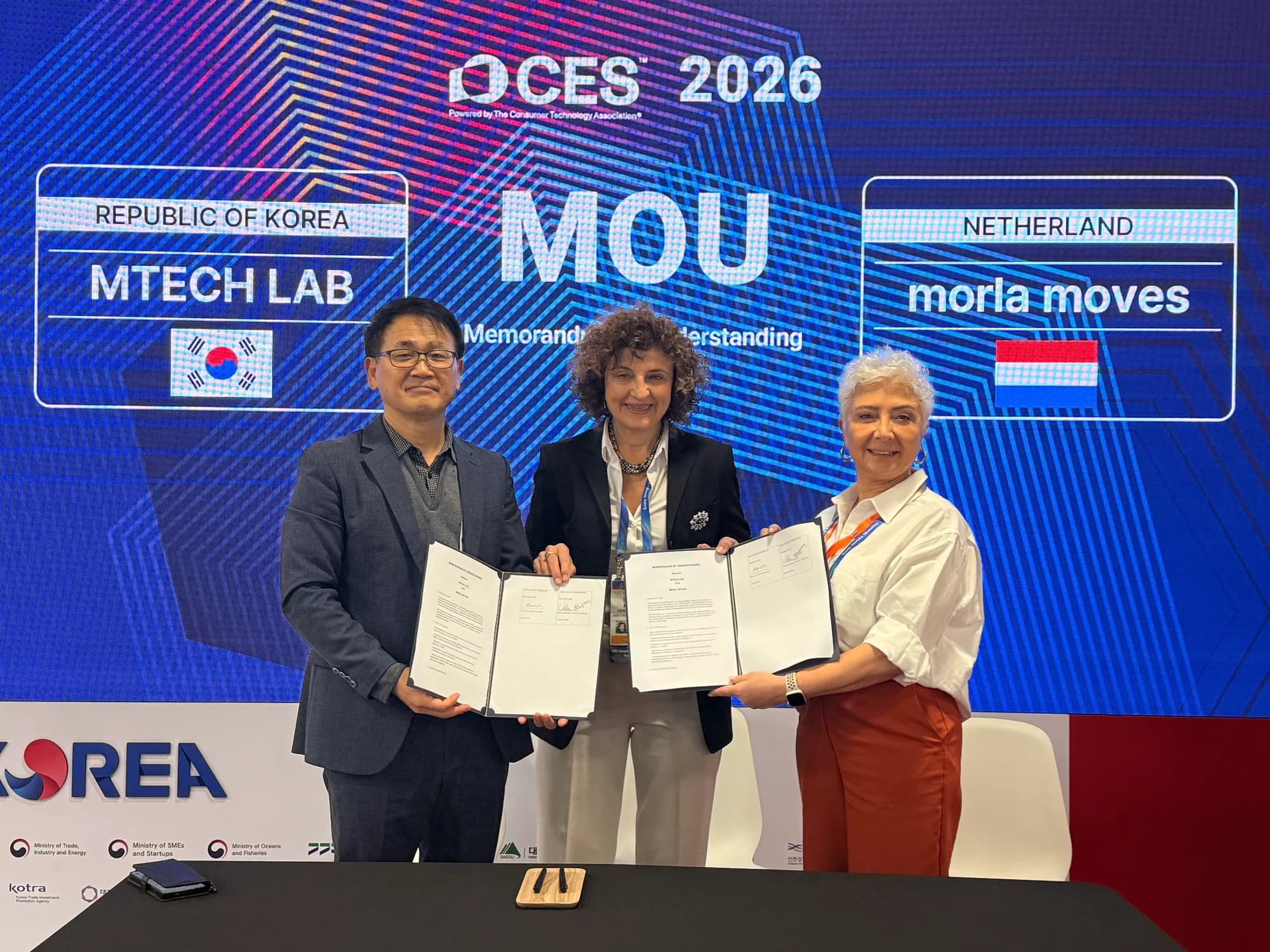 MTechLab and MORLA MOVES representatives after signing their CES 2026 MOU